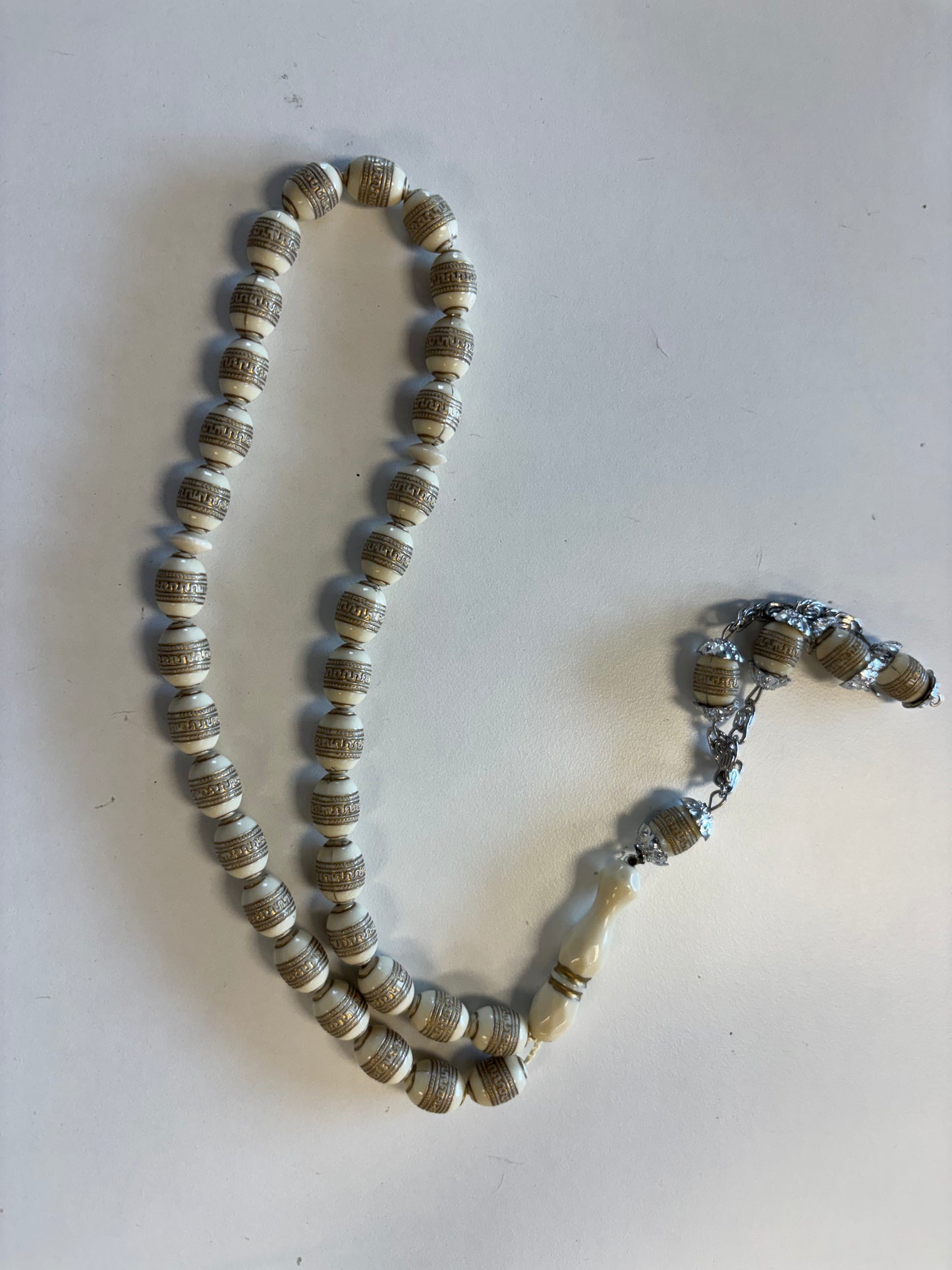 99 tan with small rings dhikr beads