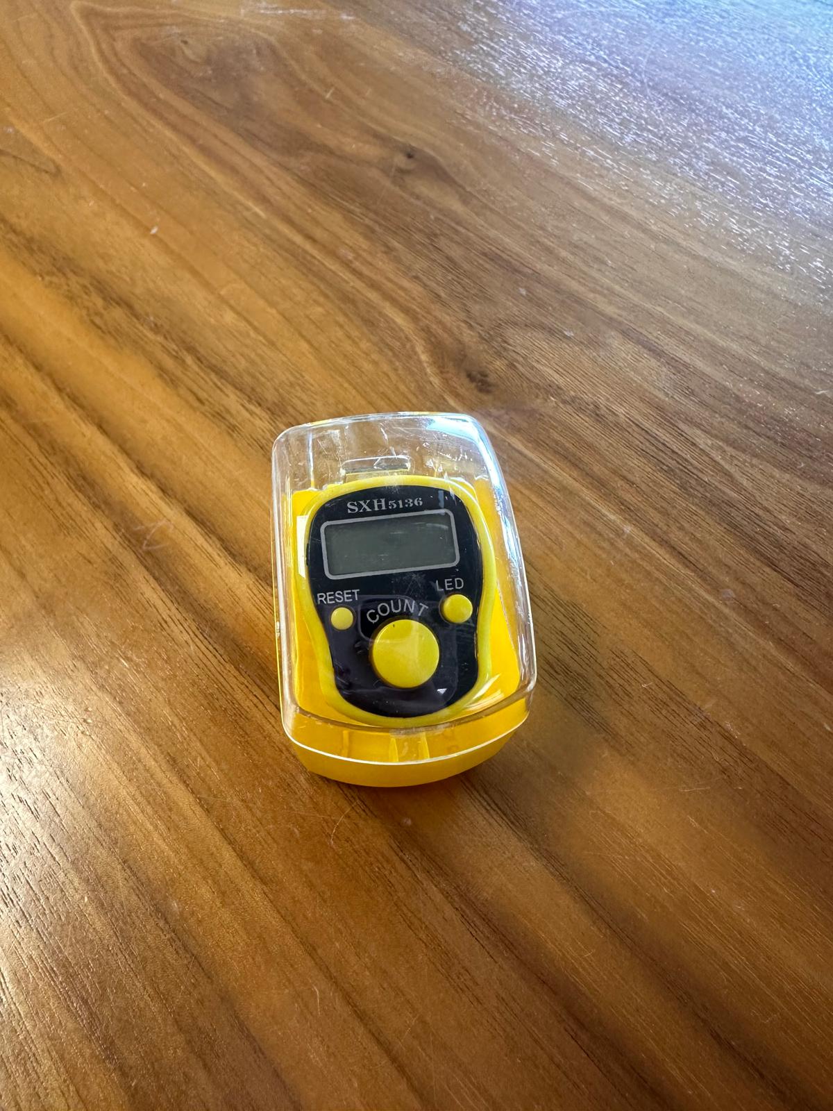 Yellow LED light dhikr clicker in case